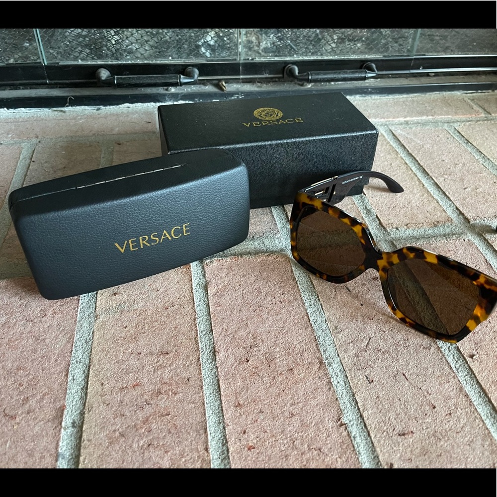 Versace sunglasses. My loss is your gain.